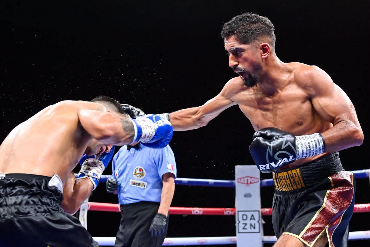 Tarik Zaina lands a punch during a professional boxing match